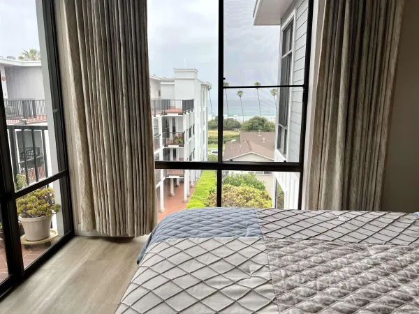 a view of balcony and a yard