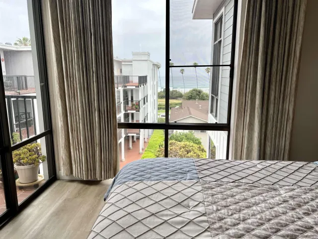 a view of balcony and a yard