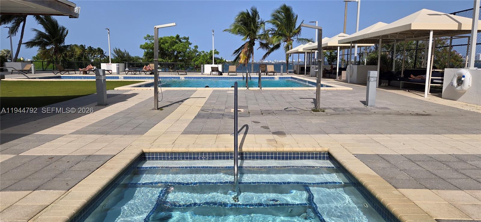 600 Northeast 36th Street, Unit 1509 Miami, FL 33137 - Photo 16 of 21 a view of a swimming pool with a patio