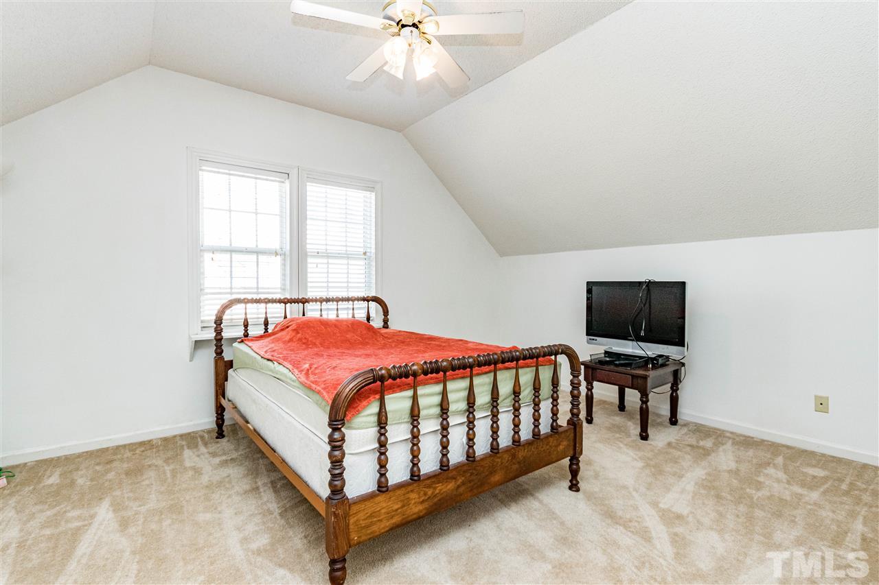4233 Fowler Ridge Drive Raleigh, NC 27616 - Photo 18 of 28 Located off the bonus room upstairs. Spacious fourth bedroom with walk in closet