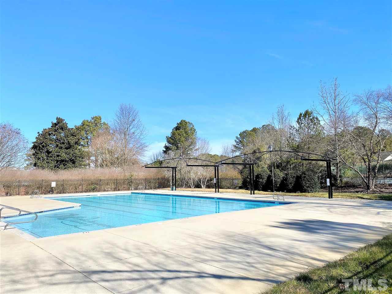 4233 Fowler Ridge Drive Raleigh, NC 27616 - Photo 27 of 28 Neighborhood pool with clubhouse and playground