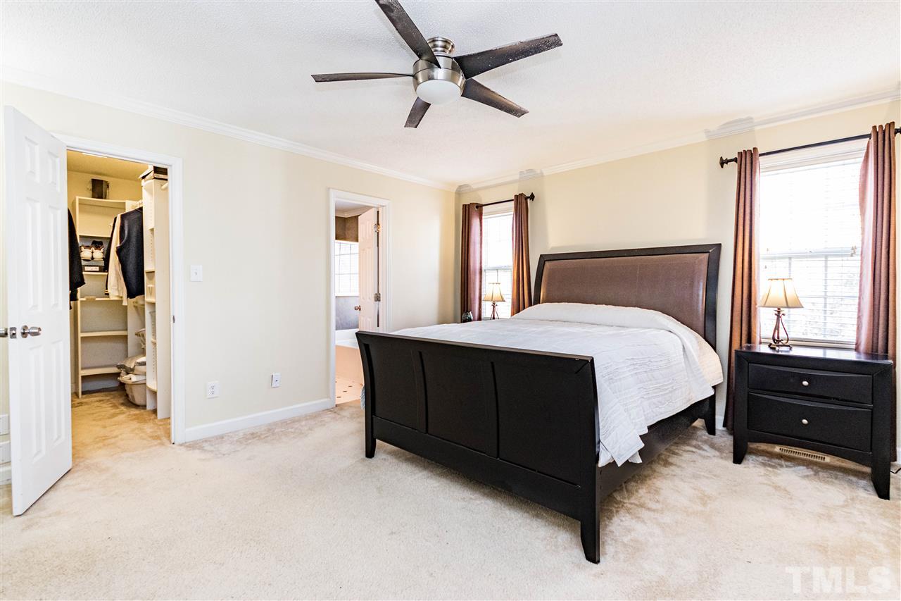 4233 Fowler Ridge Drive Raleigh, NC 27616 - Photo 10 of 28 Spacious master suite with walk in closet, ceiling fan.