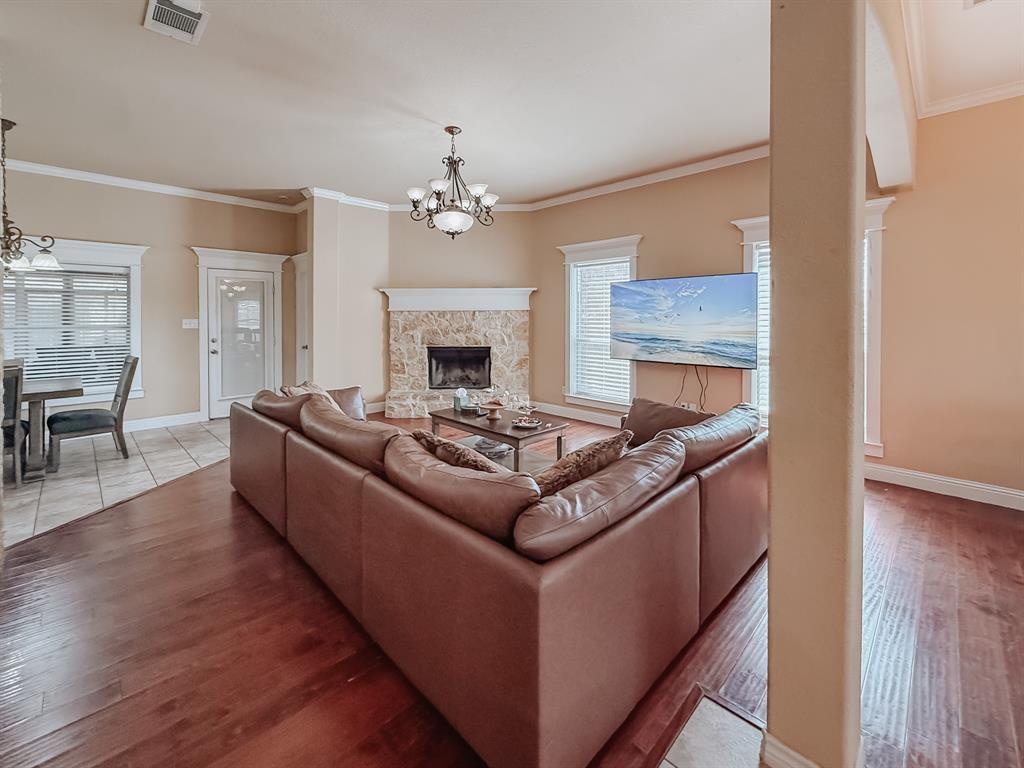 100 Timbershade Drive Red Oak, TX 75154 - Photo 13 of 38 a living room with furniture and a fireplace