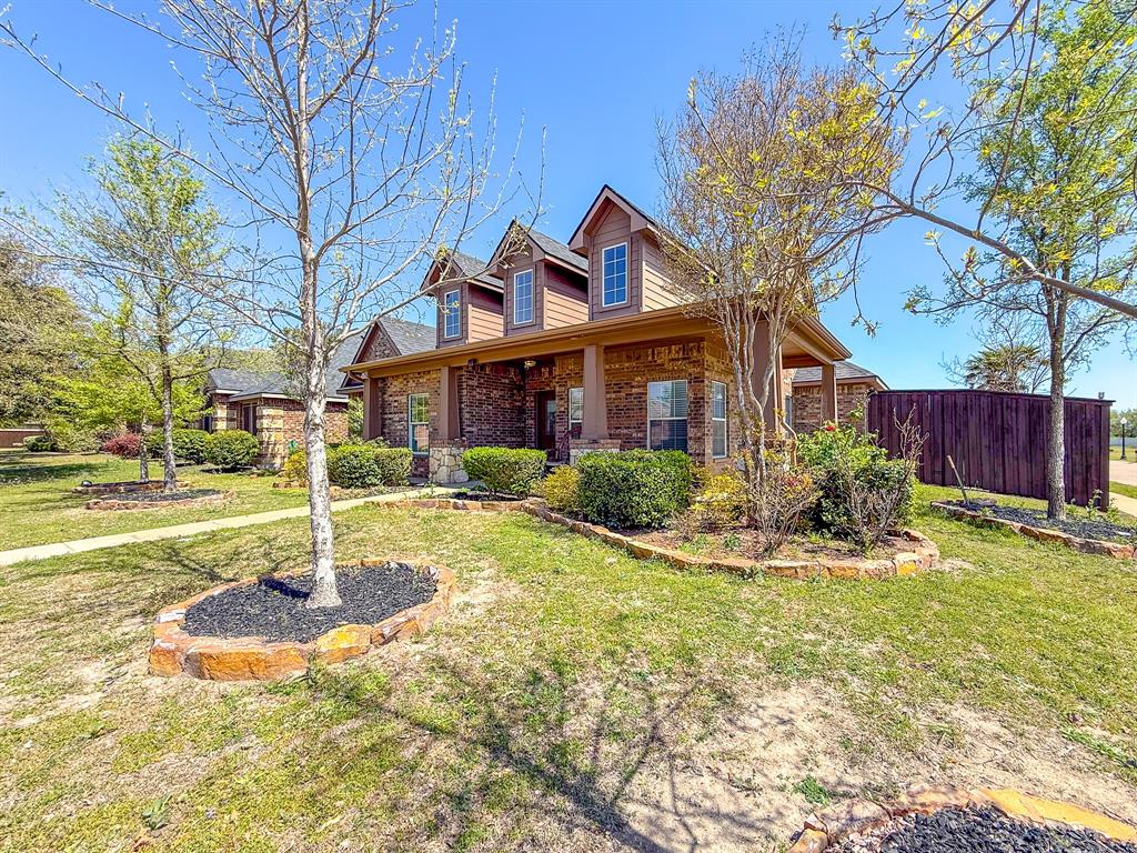 100 Timbershade Drive Red Oak, TX 75154 - Photo 2 of 38 a view of a house with backyard and sitting area