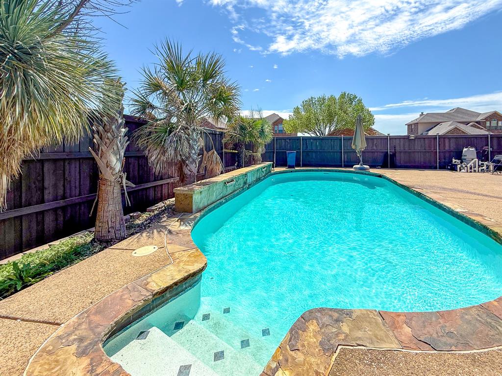100 Timbershade Drive Red Oak, TX 75154 - Photo 3 of 38 a view of a backyard with a garden