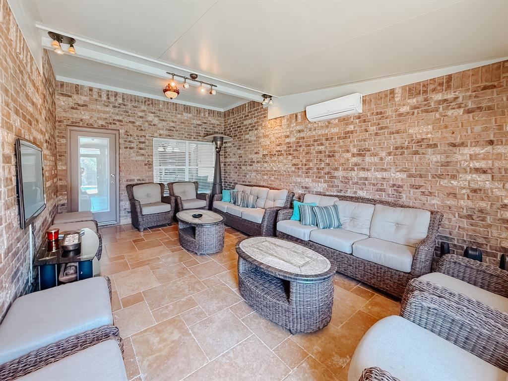 100 Timbershade Drive Red Oak, TX 75154 - Photo 34 of 38 a living room with furniture and a large window