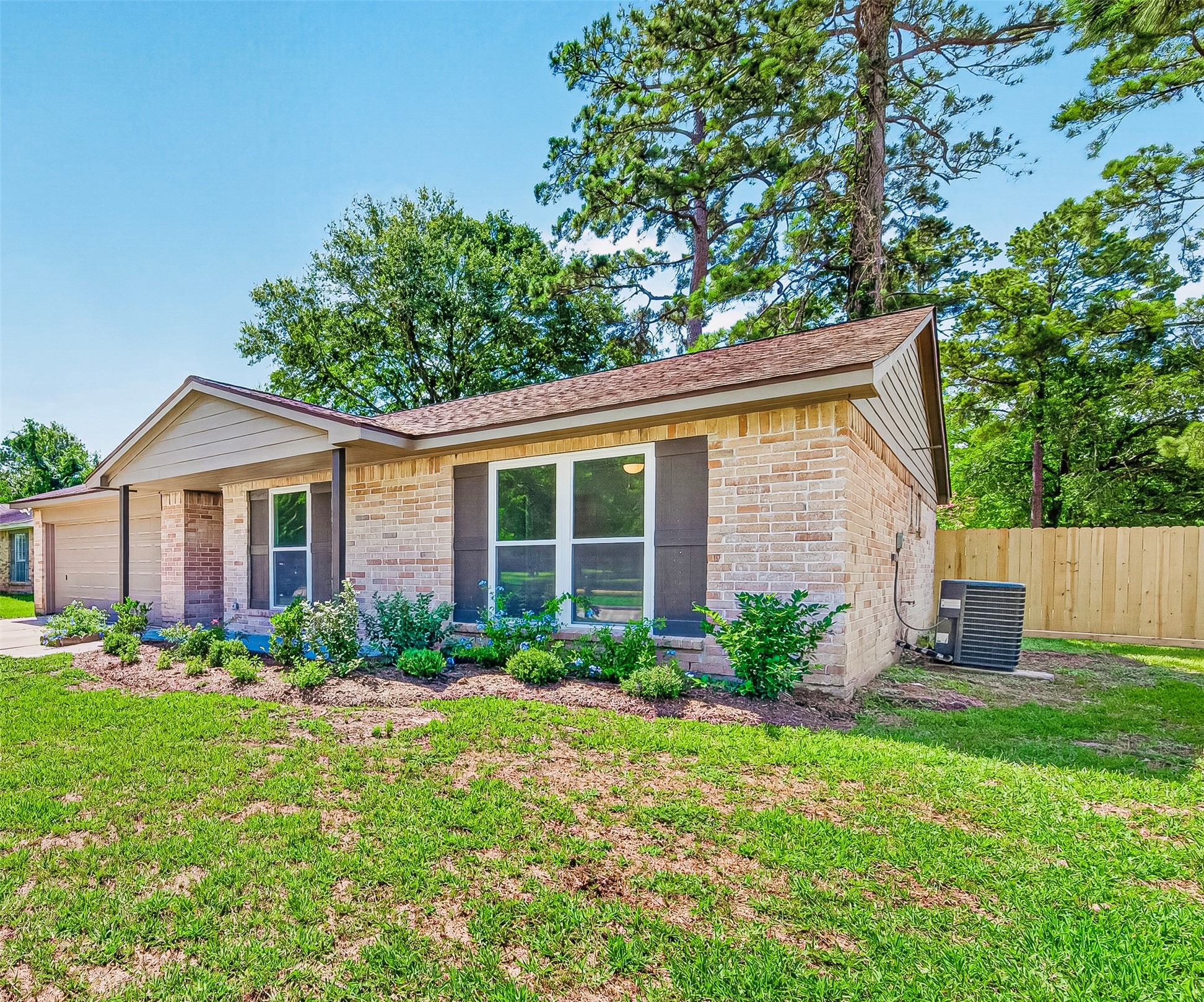 4302 Hickorygate Drive Spring, TX 77373 - Photo 2 of 23 Fresh exterior paint, a new fence, and lush landscaping offers great curb appeal.