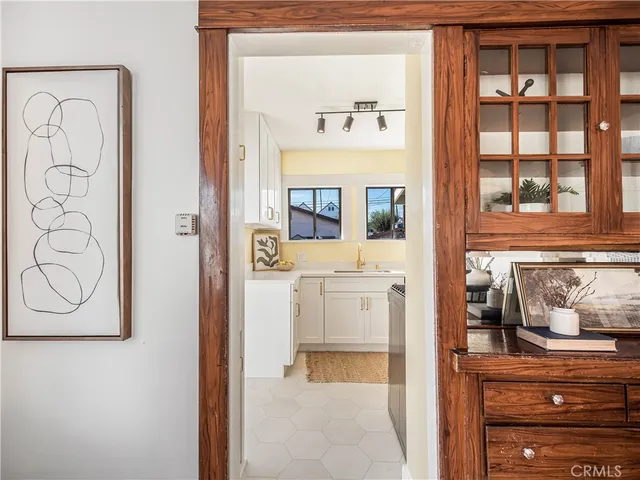 view of living room with a baby crib