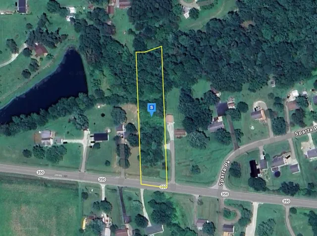 a view of a golf course with a house