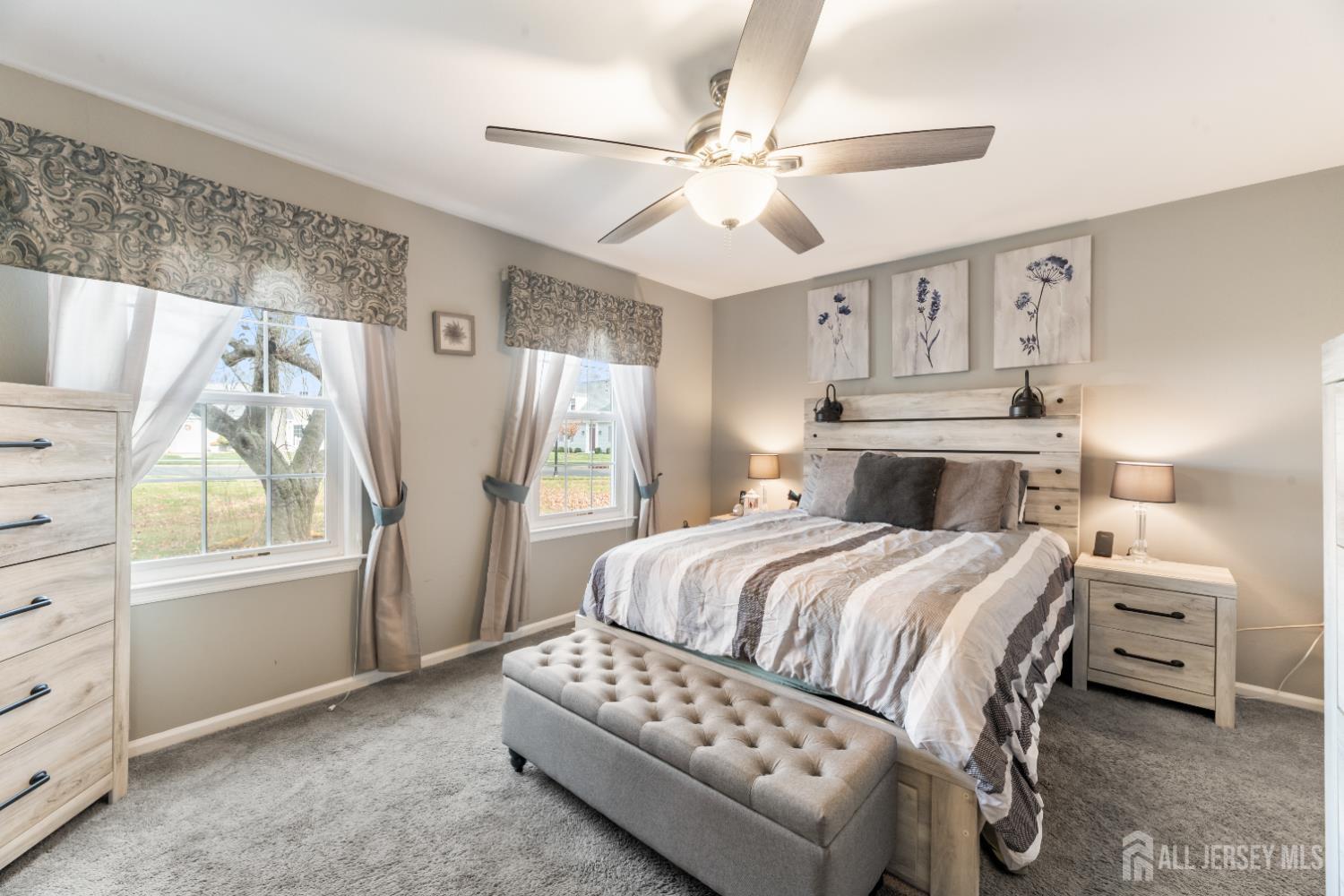 94 Gloucester Way, Unit B Monroe Township, NJ 08831 - Photo 12 of 20 a bedroom with a large bed and a window