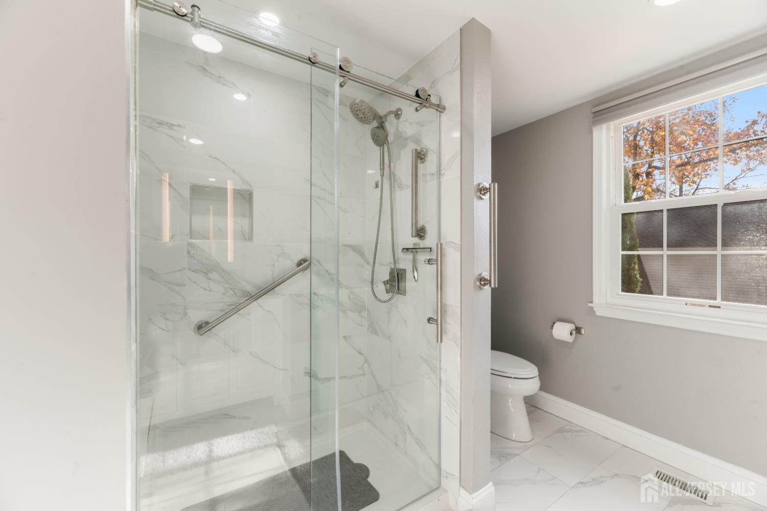 94 Gloucester Way, Unit B Monroe Township, NJ 08831 - Photo 16 of 20 a bathroom with a shower and a toilet