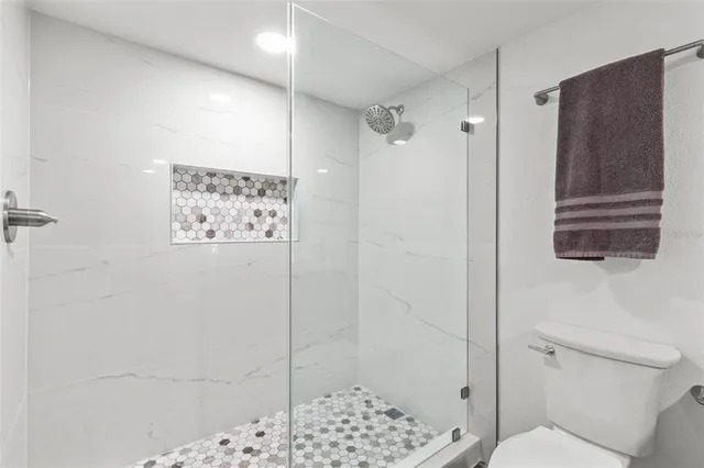 a view of a room with racks on the wall