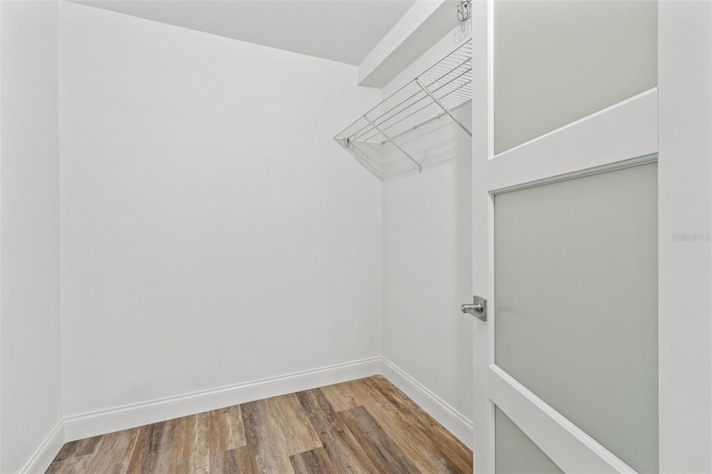 14950 Gulf Boulevard, Unit 503 Madeira Beach, FL 33708 - Photo 22 of 43 a view of a room with racks on the wall