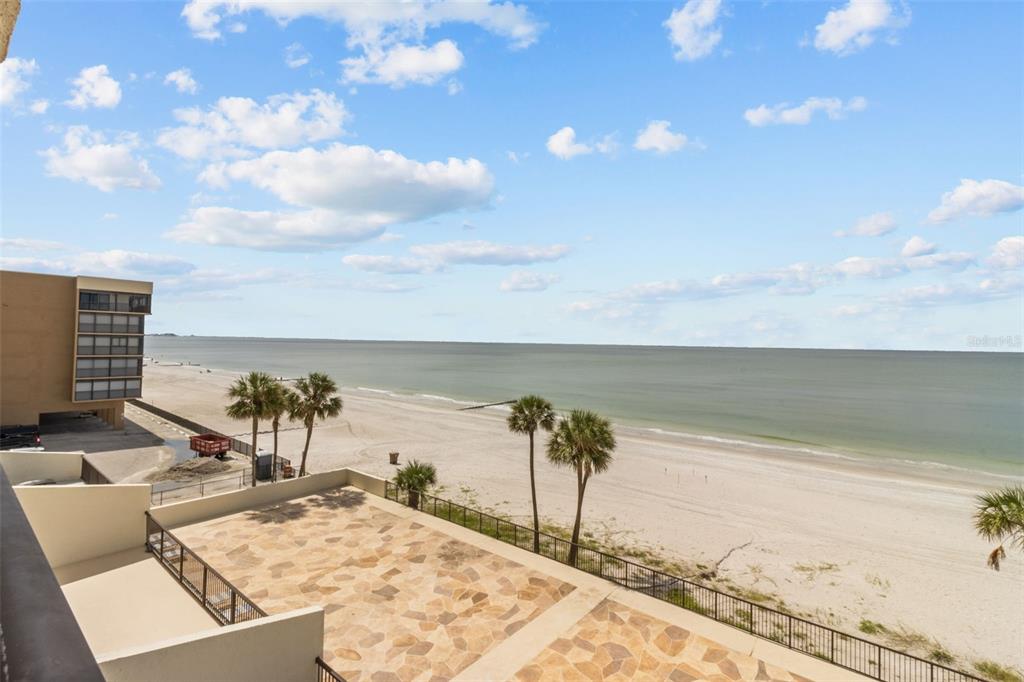 14950 Gulf Boulevard, Unit 503 Madeira Beach, FL 33708 - Photo 31 of 43 a view of a terrace with a lake