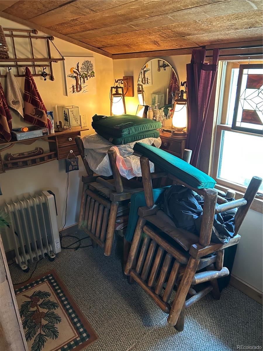2130 Pitchfork Road Hartsel, CO 80449 - Photo 12 of 30 a view of a chairs and table in the balcony