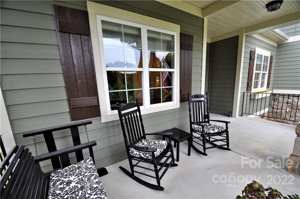 186 Chaska Loop Troutman, NC 28166 - Photo 3 of 48 a outdoor living space with furniture and a window