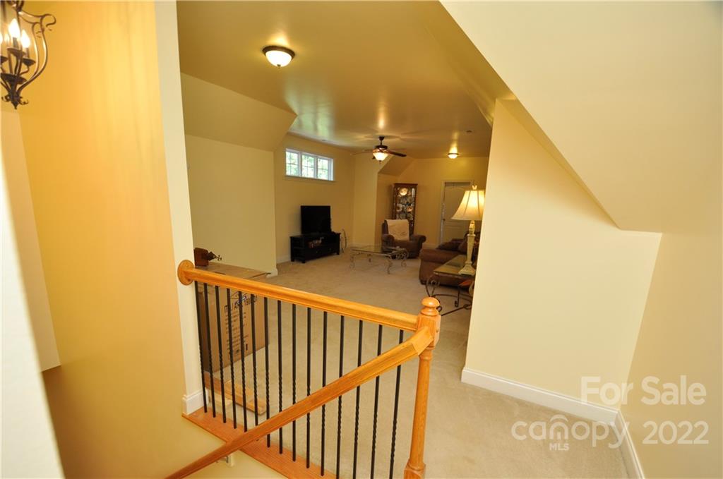 186 Chaska Loop Troutman, NC 28166 - Photo 41 of 48 a view of a hallway with a door