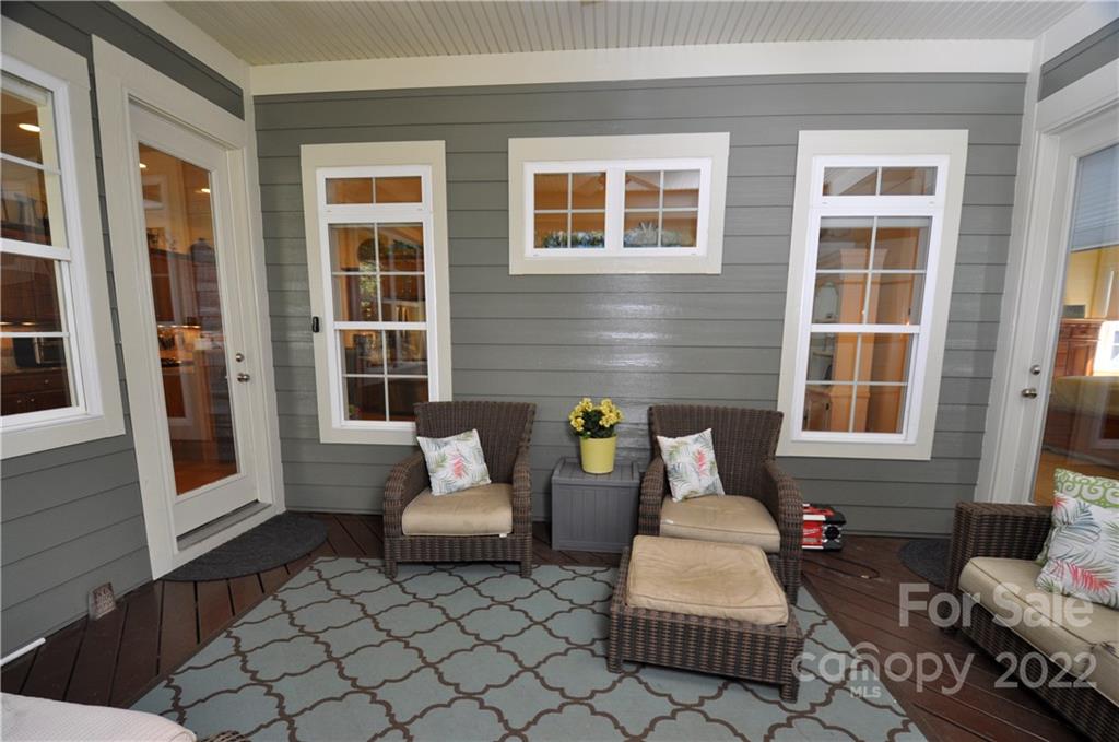 186 Chaska Loop Troutman, NC 28166 - Photo 45 of 48 a outdoor space with patio couches and potted plants