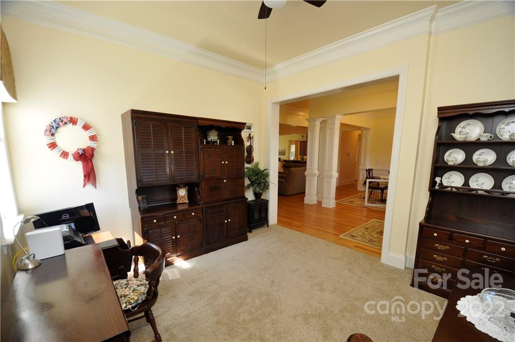 186 Chaska Loop Troutman, NC 28166 - Photo 10 of 48 a bedroom with a bed and a dresser