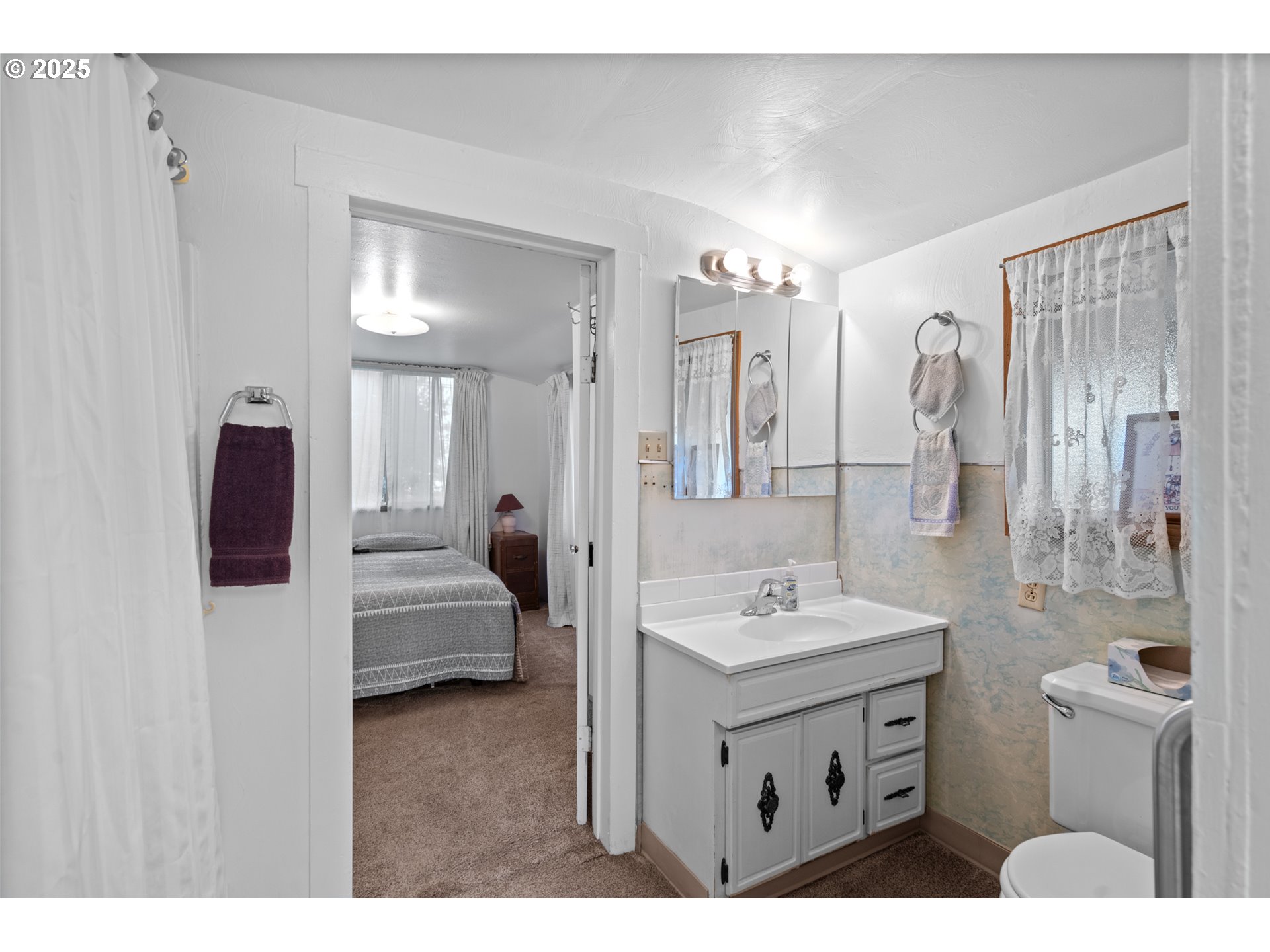 32534 Diagonal Boulevard Hermiston, OR 97838 - Photo 11 of 35 a bathroom with a sink double vanity granite tub shower and a mirror