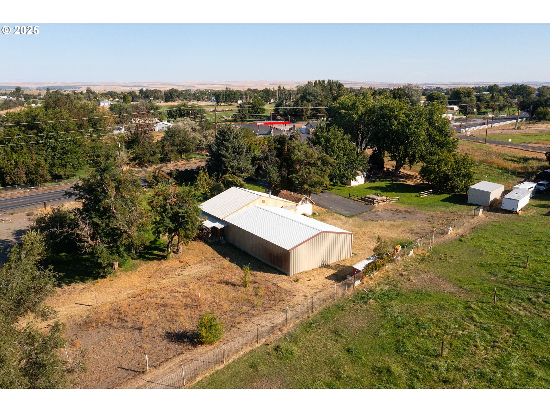 32534 Diagonal Boulevard Hermiston, OR 97838 - Photo 21 of 35 an aerial view of a house with a yard lake view and mountain view
