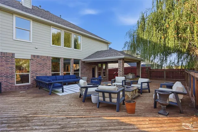 a view of a lounge chairs on the deck