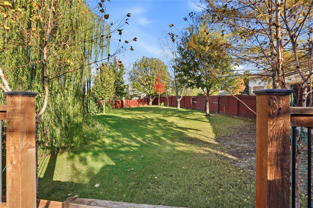 1017 Long Pointe Avenue Fort Worth, TX 76108 - Photo 15 of 28 a view of a backyard