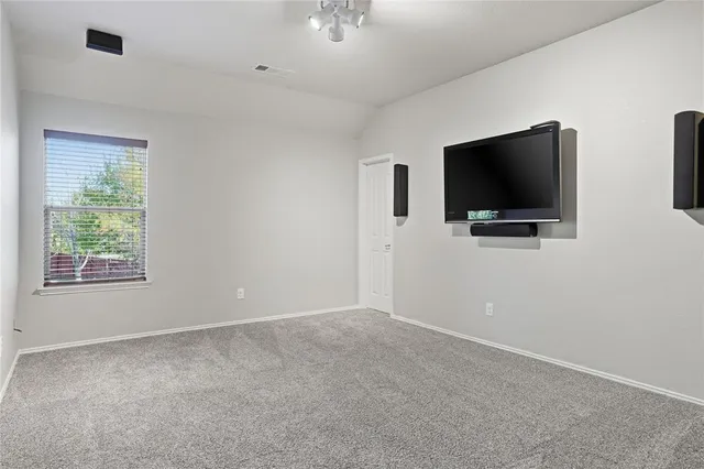 a livingroom with a flat screen tv