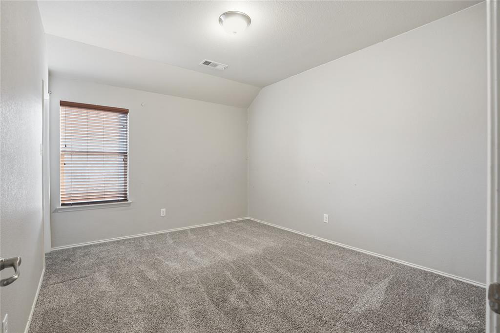 1017 Long Pointe Avenue Fort Worth, TX 76108 - Photo 24 of 28 an empty room with windows