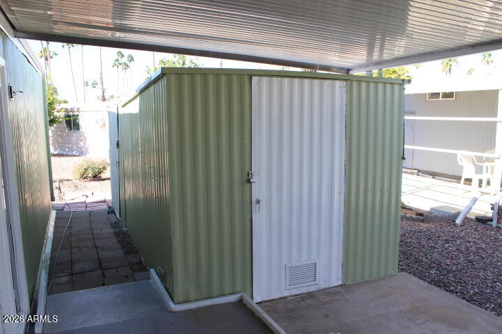 303 South Recker Road, Unit 38 Mesa, AZ 85206 - Photo 18 of 19 a view of a backyard