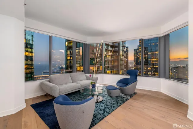 a view of water heater and building in the background