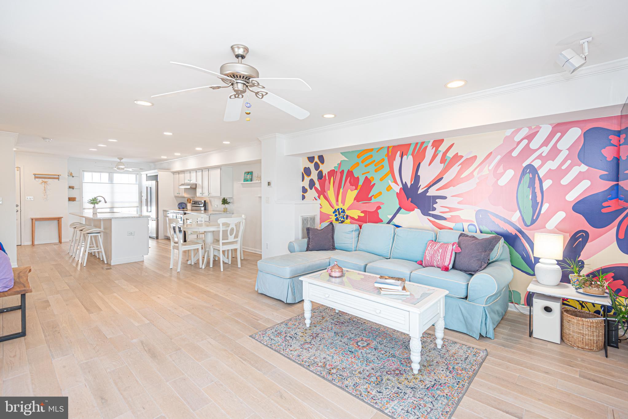 37845 Salt Grass Cove, Unit 89 Ocean View, DE 19970 - Photo 24 of 83 a living room with furniture and wooden floor