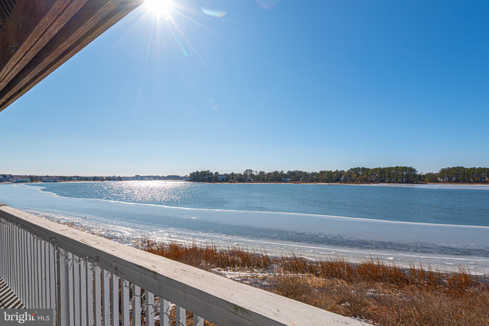 37845 Salt Grass Cove, Unit 89 Ocean View, DE 19970 - Photo 28 of 83 a view of an ocean from a balcony