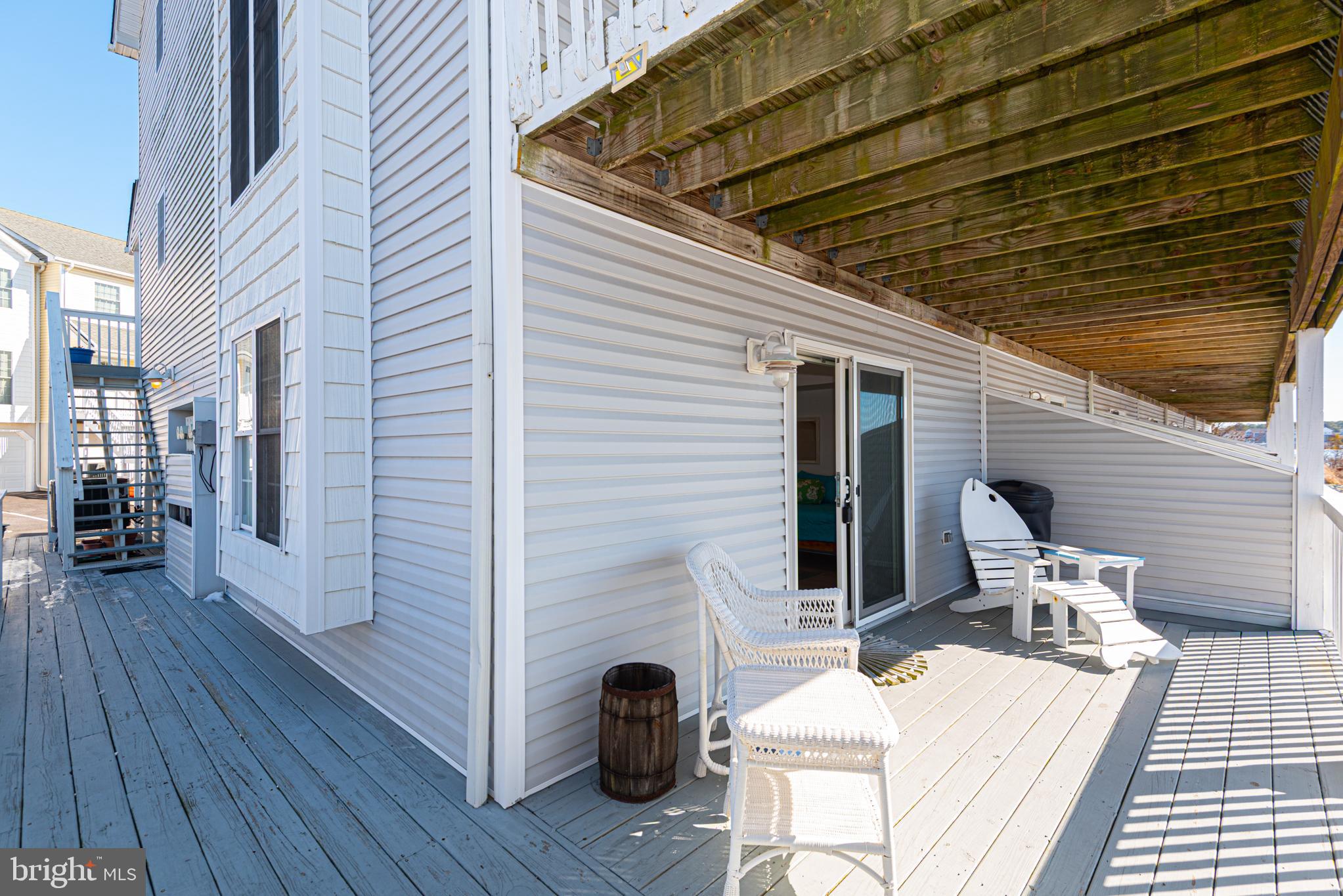 37845 Salt Grass Cove, Unit 89 Ocean View, DE 19970 - Photo 5 of 83 a view of a patio in back of house