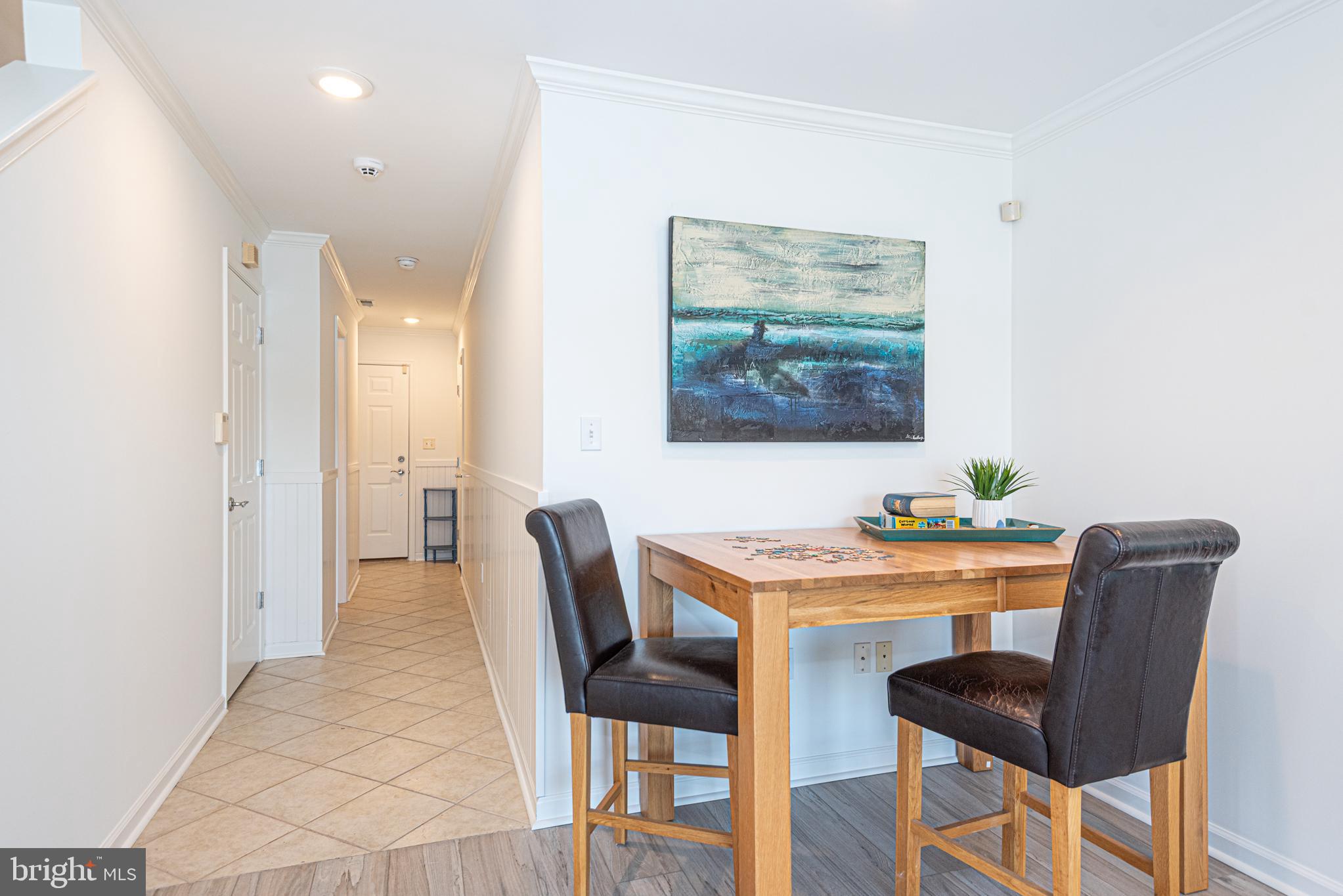 37845 Salt Grass Cove, Unit 89 Ocean View, DE 19970 - Photo 57 of 83 a view of a dining room with furniture