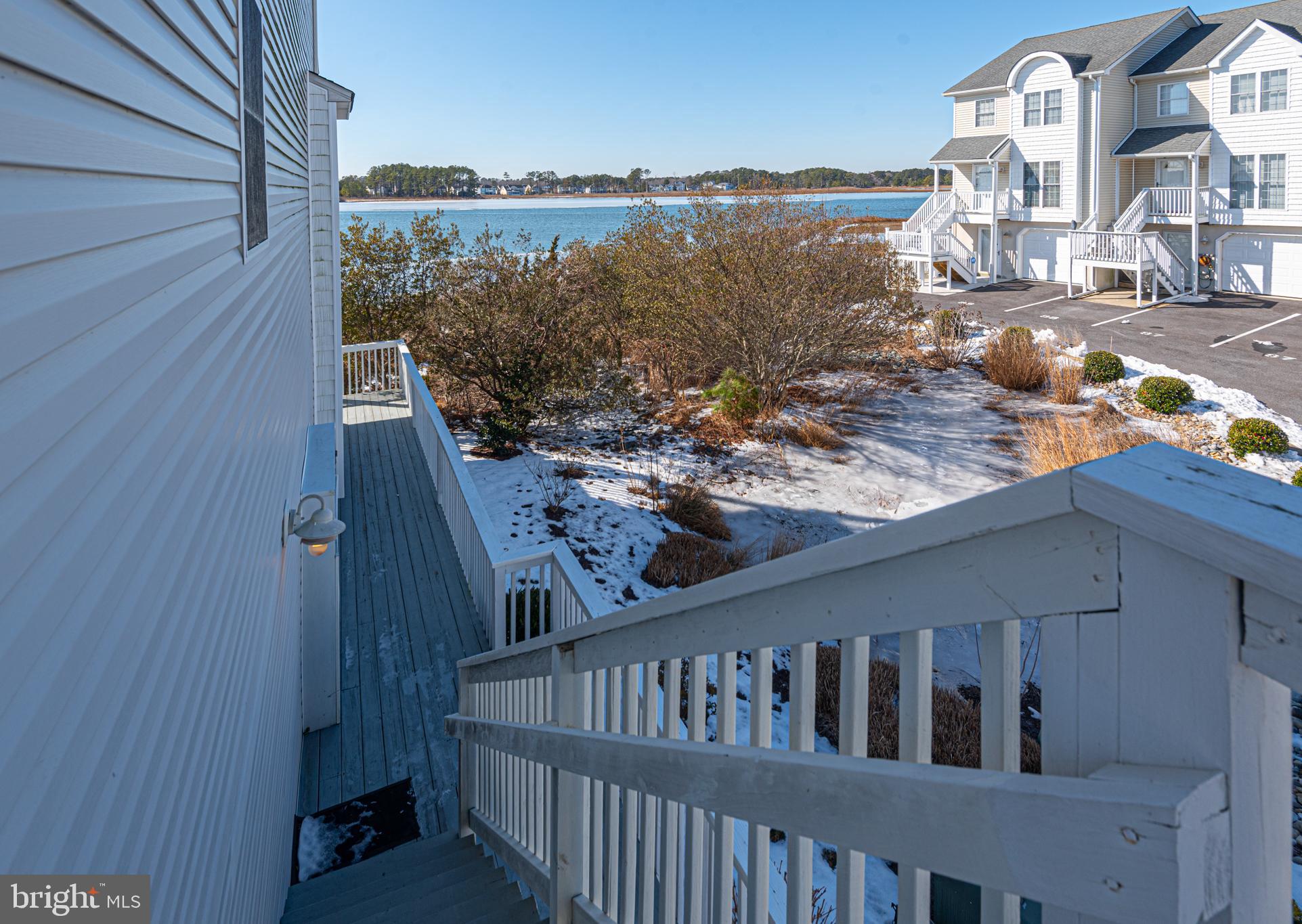 37845 Salt Grass Cove, Unit 89 Ocean View, DE 19970 - Photo 6 of 83 a view of a balcony with an ocean view