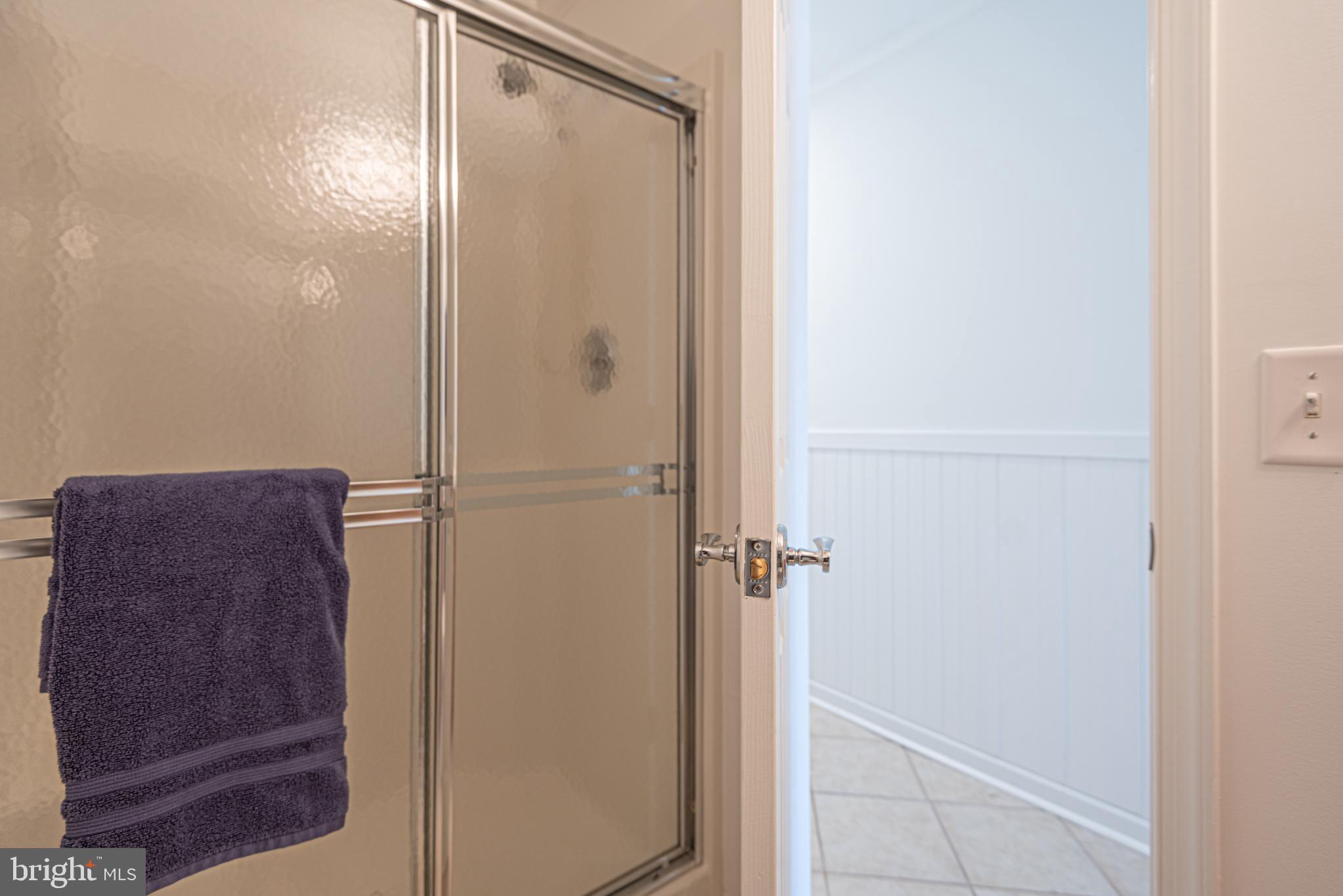 37845 Salt Grass Cove, Unit 89 Ocean View, DE 19970 - Photo 69 of 83 a bathroom with a bathtub