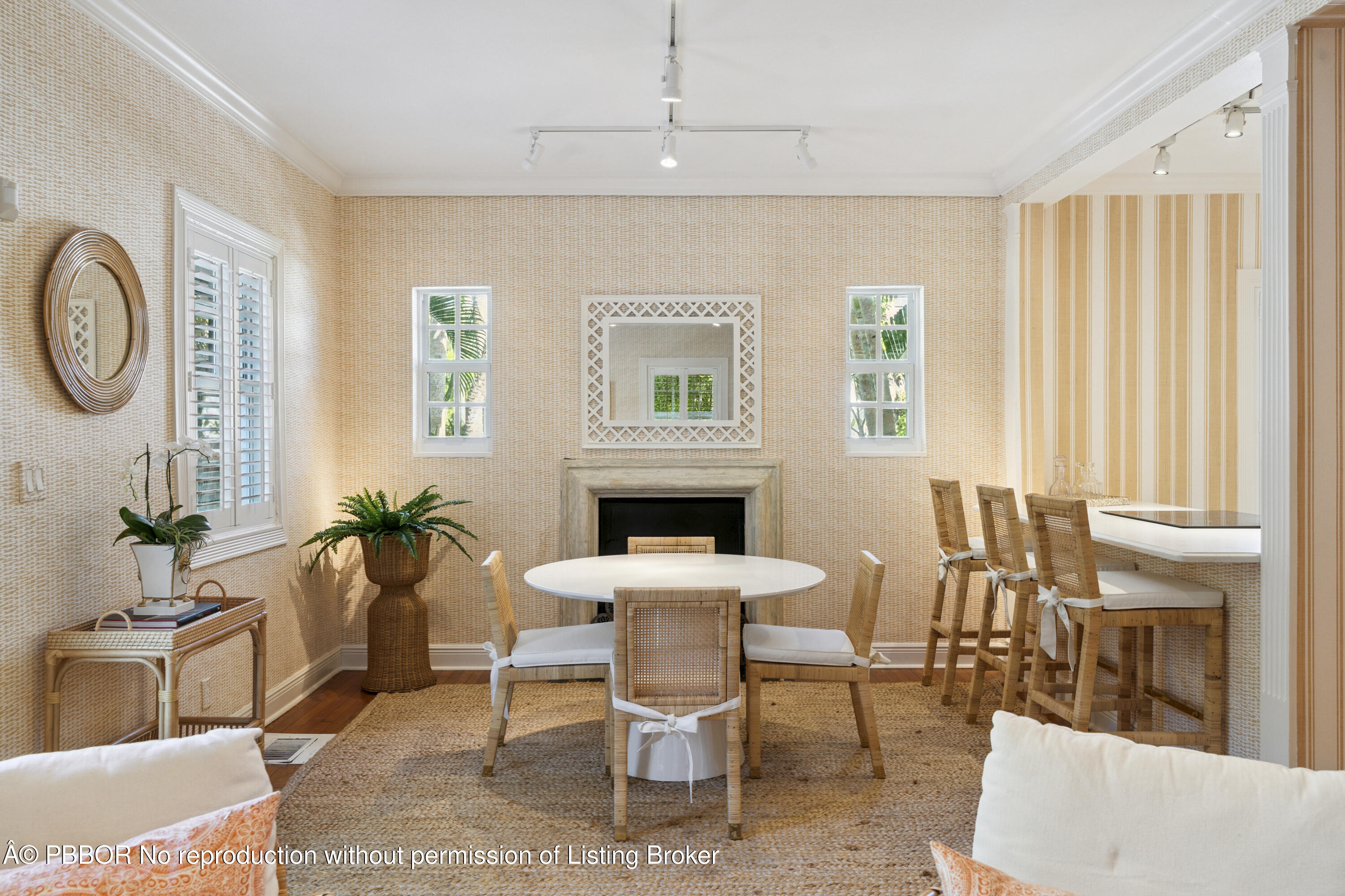 a dining room with furniture and window