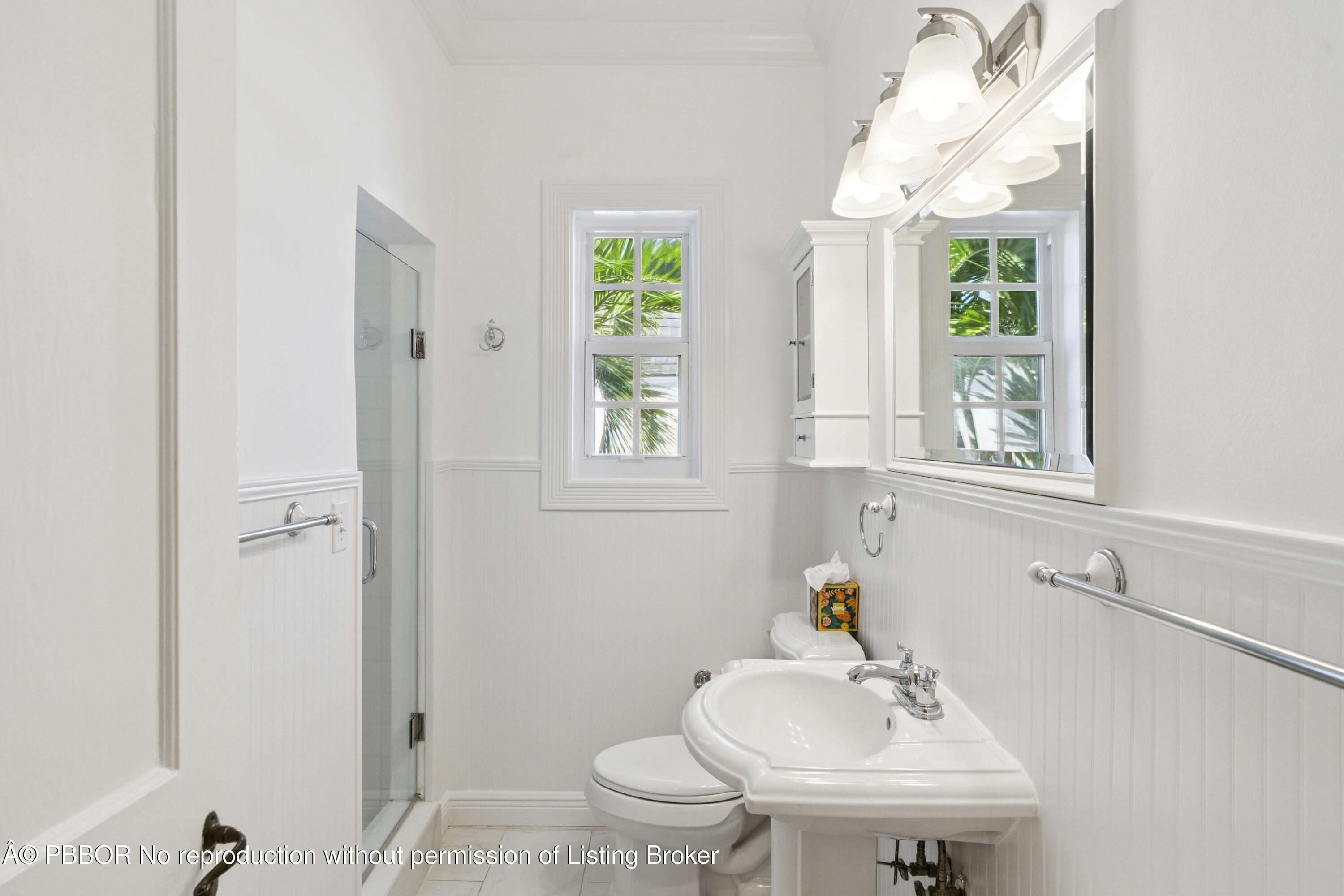 151 South County Road, Unit 1 Palm Beach, FL 33480 - Photo 19 of 21 a bathroom with a sink a toilet and a window