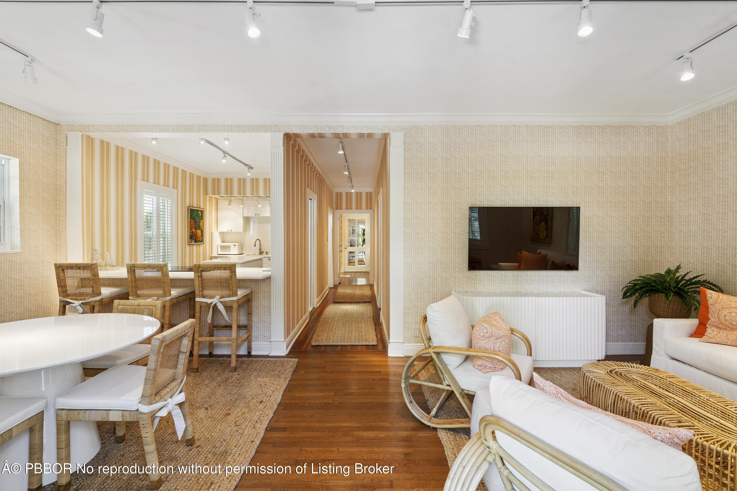 151 South County Road, Unit 1 Palm Beach, FL 33480 - Photo 6 of 21 a living room with furniture and a flat screen tv