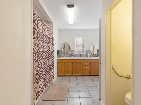 a kitchen with a sink and a stove