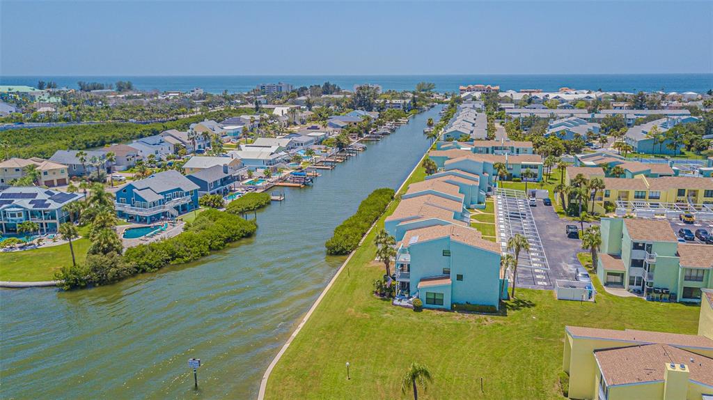 1 Windrush Boulevard, Unit 54 Indian Rocks Beach, FL 33785 - Photo 11 of 37 an aerial view of residential houses with outdoor space