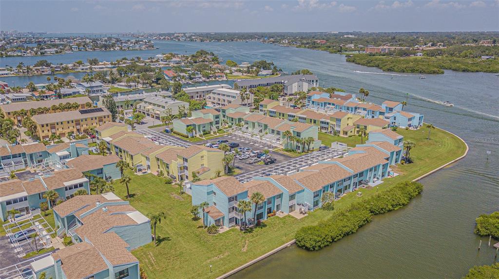 1 Windrush Boulevard, Unit 54 Indian Rocks Beach, FL 33785 - Photo 37 of 37 an aerial view of residential houses with outdoor space