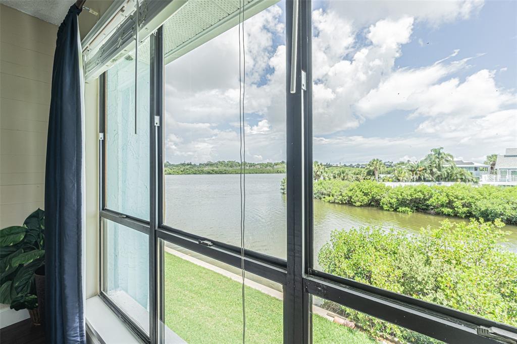 1 Windrush Boulevard, Unit 54 Indian Rocks Beach, FL 33785 - Photo 10 of 37 a view of sky from window