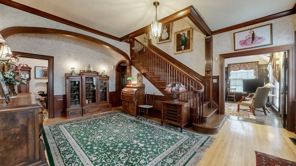 505 Walnut Street Paris, TN 38242 - Photo 12 of 54 a view of staircase with furniture and a rug