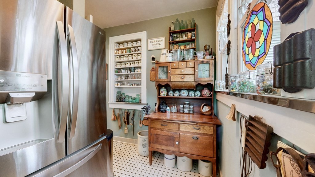 505 Walnut Street Paris, TN 38242 - Photo 20 of 54 a view of walk in closet with clothes and shoes