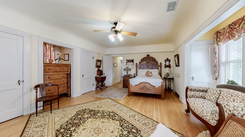 505 Walnut Street Paris, TN 38242 - Photo 2 of 54 a bedroom with furniture and a rug