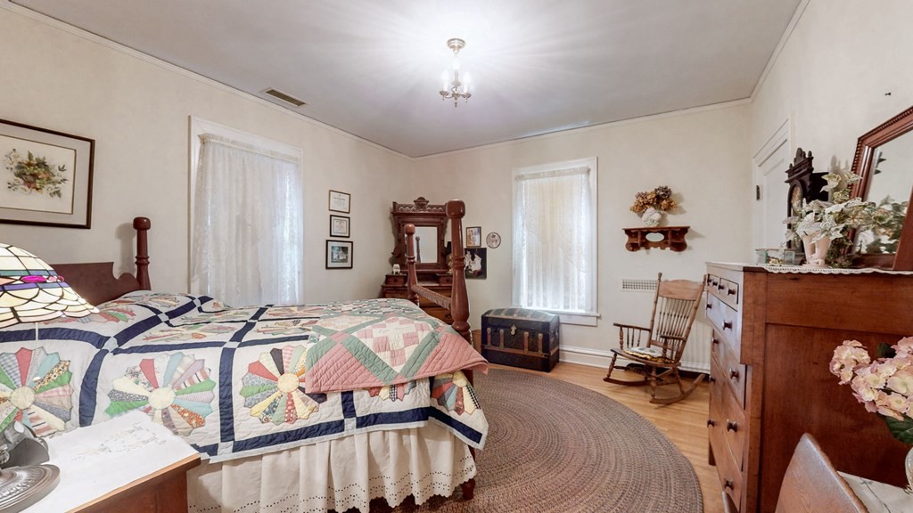 505 Walnut Street Paris, TN 38242 - Photo 35 of 54 a bed room with furniture and a chair