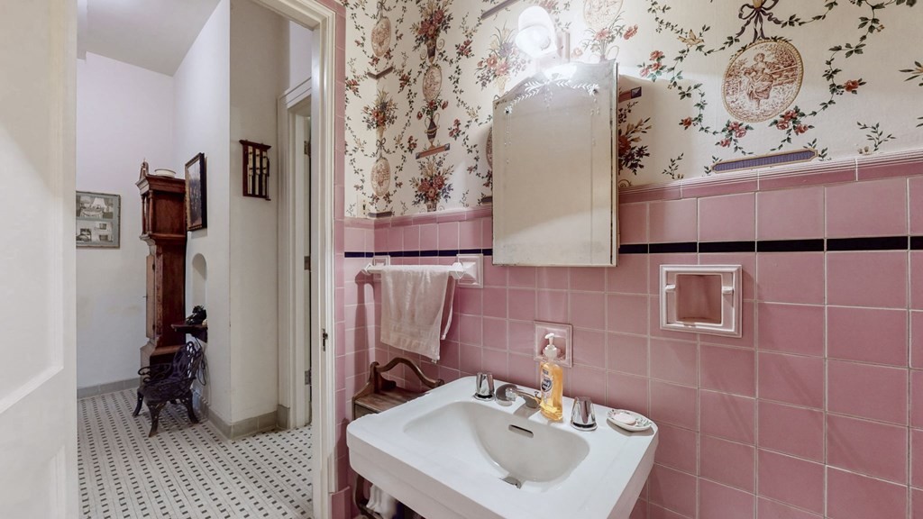 505 Walnut Street Paris, TN 38242 - Photo 36 of 54 a bathroom with a sink and mirror