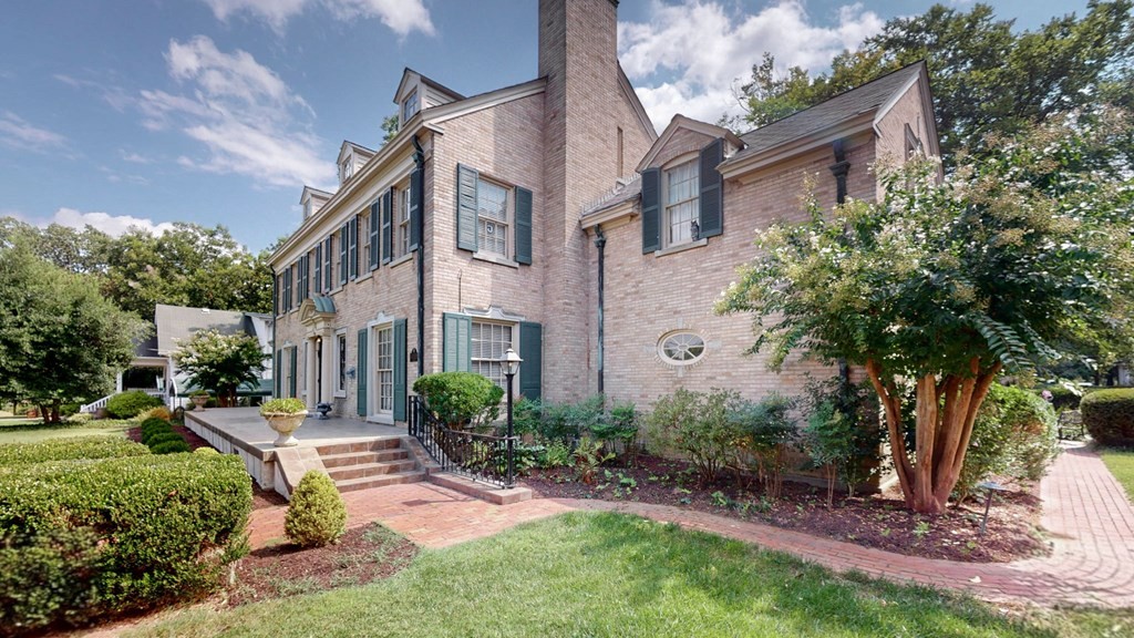 505 Walnut Street Paris, TN 38242 - Photo 46 of 54 a view of a building with a yard